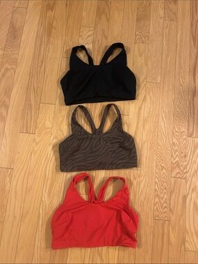 all in motion Women’s 3-Pack Sports Bras - Black, Brown Zebra, Red